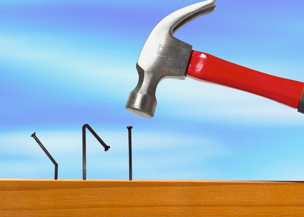 Top 5 E-Commerce Mistakes Small Businesses Make (and How to Avoid Them) mistake, nail, hammer, bent, try, intent, symbol, metaphor, failure, wood, mistake, mistake, mistake, mistake, mistake, try